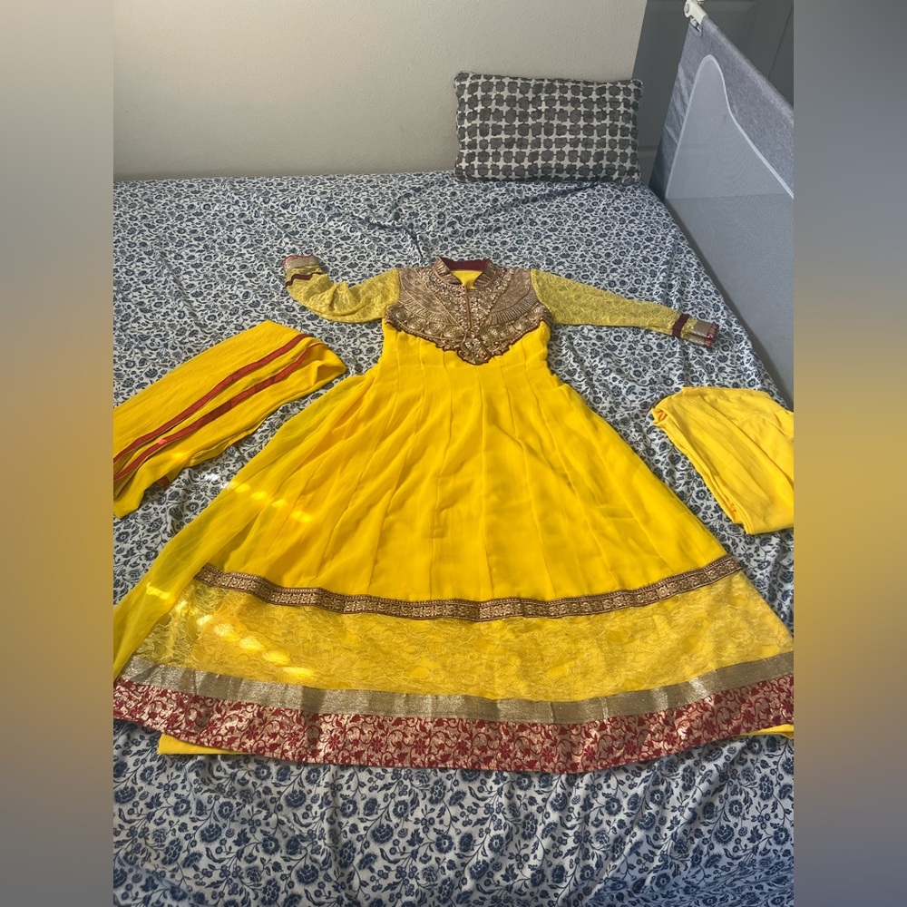 Yellow Traditional Dress with Red and Gold Accents